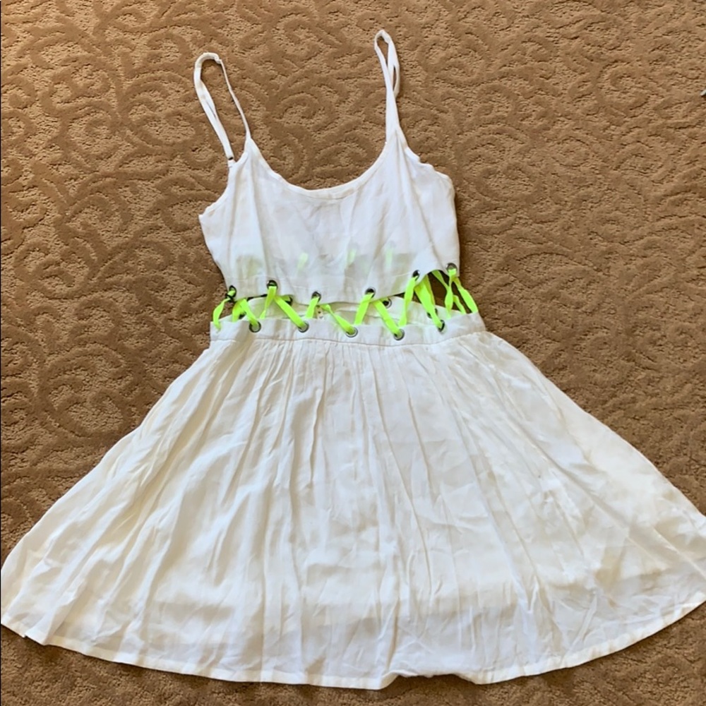 rehab clothing white dress green lacing in middle.